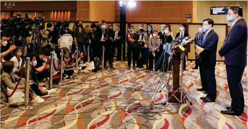  ?? Photos: Yik Yeung-man ?? Chief executive candidate John Lee meets the press yesterday and takes questions on his policy ideas after earlier setting out his vision for Hong Kong.