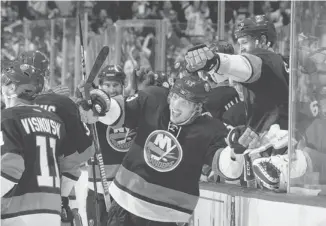  ?? Bruce Bennett/getty Images ?? The Islanders’ Casey Cizikas celebrates his insurance goal at 18:44 of the third period against Pittsburgh.