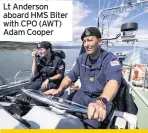  ??  ?? Lt Anderson aboard HMS Biter with CPO (AWT) Adam Cooper