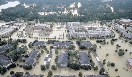  ?? Win McNamee ?? > Flooded homes near Lake Houston after Hurricane Harvey struck in Houston, Texas