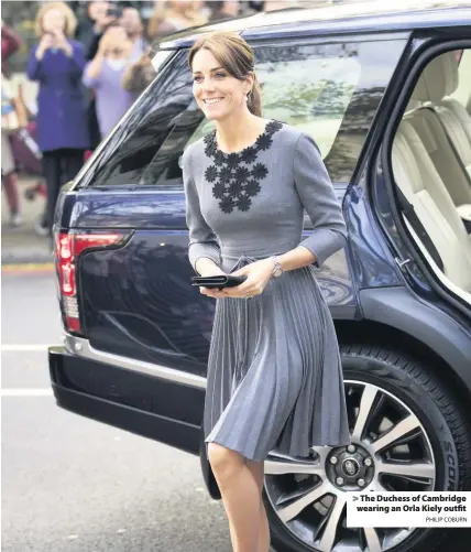  ?? PHILIP COBURN ?? &gt; The Duchess of Cambridge wearing an Orla Kiely outfit