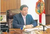  ?? BRENDAN FARRINGTON/AP ?? Gov. Ron DeSantis has put off accepting a $93.2 billion budget that was approved by the Legislatur­e in March.