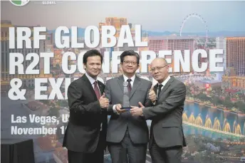  ??  ?? (From left) CMS Roads senior regional manager Abdul Rahim Jamal, CMS Group chief operating officer Goh Chii Bing and CMS Works chief executive officer and head of CMS constructi­on and road maintenanc­e division Karim Reduan collecting the award on behalf of CMS in Las Vegas.