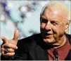  ?? SAM GREENWOOD / GETTY IMAGES ?? The head-turning Ric “Nature Boy” Flair is hosting a celebrity tailgating party Sunday.