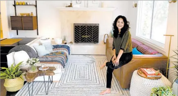  ?? Photograph­s by Jesse Goddard For The Times ?? IN HER Burbank home, Alyssa Diaz says she wants friends to “feel loved and safe when they’re here. Like being a little kid again.”