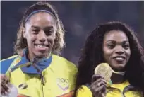  ??  ?? Archivo. La atleta colombiana Caterine Ibarguen (d) junto a la venezolana Yulimar Rojas.