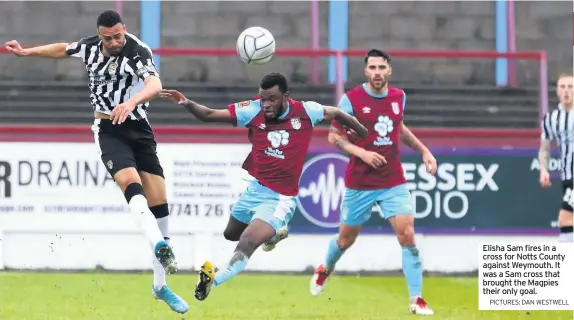  ?? PICTURES: DAN WESTWELL ?? Elisha Sam fires in a cross for Notts County against Weymouth. It was a Sam cross that brought the Magpies their only goal.