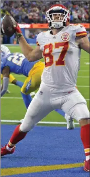  ?? (AP/Jayne Kamin-Oncea) ?? Kansas City Chiefs tight end Travis Kelce celebrates after catching a 17-yard touchdown pass from quarterbac­k Patrick Mahomes in the fourth quarter Sunday night against the Los Angeles Chargers at SoFi Stadium in Inglewood, Calif. The Chiefs took a three-game lead in the AFC West with a 30-27 win over their division rivals.