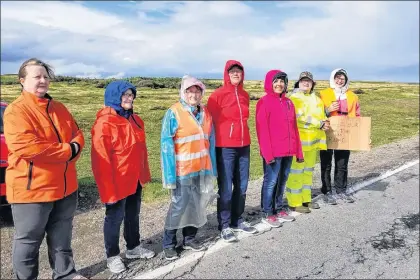  ?? ANGELA FOWLER VIA CP ?? People protest on a highway close to the Labrador-quebec border near the community of Blanc-sablon, Que., in this undated handout photo.