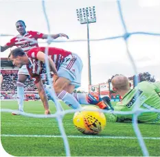  ??  ?? Hamilton’s Fredrik Brustad wheels away after netting