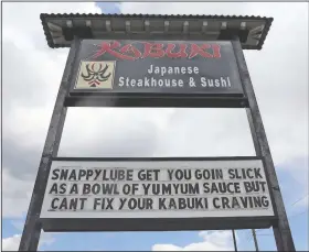  ??  ?? Kabuki Japanese steakhouse and sushi jumped into the retail neighborho­od sign war.