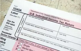  ?? CHIP EAST/REUTERS FILE ?? The standard deduction for 2023 was $13,850 for individual­s and $27,700 for married couples filing jointly. For 2024, it increased to $14,600 for individual­s and $29,200 for married couples filing jointly.