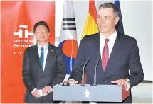  ?? Yonhap ?? Spanish Prime Minister Pedro Sanchez speaks as Culture Minister Park Bo-gyoon listens, during a ceremony announcing the location of the Cervantes Institute in Myeong-dong, Seoul, Nov. 17.