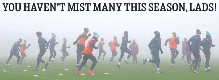  ?? GETTY IMAGES ?? Chasing shadows: City’s players train in the fog before tonight’s cup clash — perhaps Leicester will hope for more of the same to disrupt Pep’s pass masters!