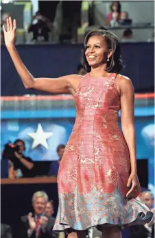  ?? ASSOCIATED PRESS ?? After first lady Michelle Obama wore a Tracy Reese dress at the Democratic National Convention in 2012, the designer had to rush to meet demand.