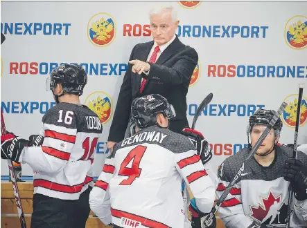  ?? ALEXANDER NEMENOV/AFP/GETTY IMAGES ?? Dave King, seen last month, has been head coach of Canada’s Olympic hockey team three times.