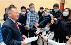  ?? Photo: Liu Xin/ GT ?? Top: Hu Zhaoming, spokespers­on for the Internatio­nal Department of the Central Committee of the CPC, speaks to the media at the end of a themed briefing on Xinjiang on February 22.