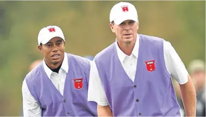  ?? Picture: PA. ?? Steve Stricker, right, is thrilled that Tiger Woods, left, is making a fine comeback.