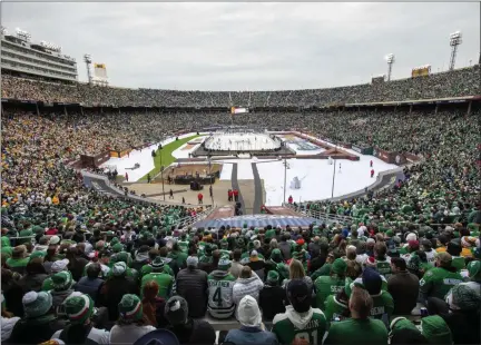  ?? JEFFREY MCWHORTER - FREELANCER, AP ?? FILE - In this Jan. 1, 2020, file photo, fans watch the NHL Winter Classic hockey game between the Dallas Stars and the Nashville Predators at the Cotton Bowl in Dallas.