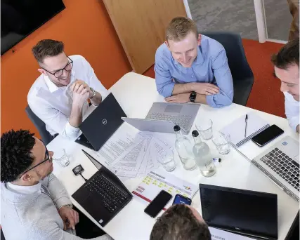  ??  ?? Some of the Redrock team at their office on Pembroke Road, Clifton