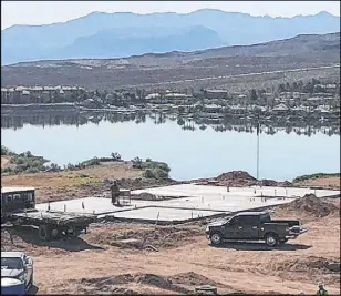  ??  ?? Earlier this year, Blue Heron broke ground on Vantage, a 37-home developmen­t on the North Shore of Lake Las Vegas.