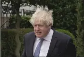  ?? KIN CHEUNG — THE ASSOCIATED PRESS ?? Former British Prime Minister Boris Johnson leaves his home in London on Tuesday.