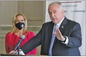  ?? (Arkansas Democrat-Gazette/Thomas Metthe) ?? Arkansas Deputy Attorney General Lloyd Warford gives details of the Medicaid fraud settlement with Preferred Family Healthcare at a news conference Thursday at the state Capitol. Attorney General Leslie Rutledge (left) said the settlement “ensures Arkansans that the Arkansas Medicaid program was made whole after this wrong and illegal act.”