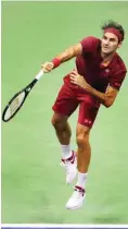  ?? Foto: AFP/Alex Pantling ?? Roger Federer hatte mit der Hitze stark zu kämpfen.