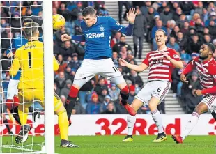  ??  ?? Rangers striker Kyle Lafferty heads against the Hamilton post in the second minute of the game.