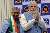  ?? — G.N. JHA ?? Prime Minister Narendra Modi with corporate affairs minister P.P. Chaudhary at the golden jubliee celebratio­ns of the Institute of Company Secretarie­s of India in New Delhi on Wednesday.