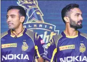  ??  ?? KKR captain Dinesh Karthik (R) and his teammate Robin Uthappa during a press conference and jersey launch ahead of IPL 2018, in Kolkata on Sunday.