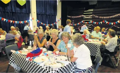  ?? Poynton High School ?? Year eight pupils from Poynton High School organised a Royal tea party and invited elderly people from the local community to enjoy sandwiches, scones and music