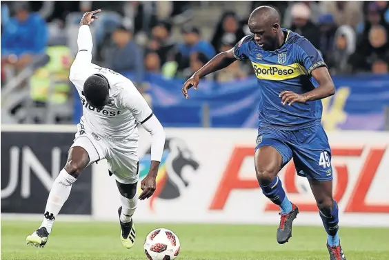  ?? /CARL FOURIE/GALLO IMAGES ?? Kwanda Mngonyama, right, of Cape Town City fights for the ball with Bidvest Wits’ Deon Hotto. Mngonyama has his teammates will take the battle to SuperSport United in the Nedbank Cup this weekend.