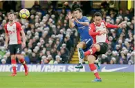  ?? AP ?? Southampto­n’s Maya Yoshida (right) clears the ball past Chelsea’s Pedro during a Premier League match. —