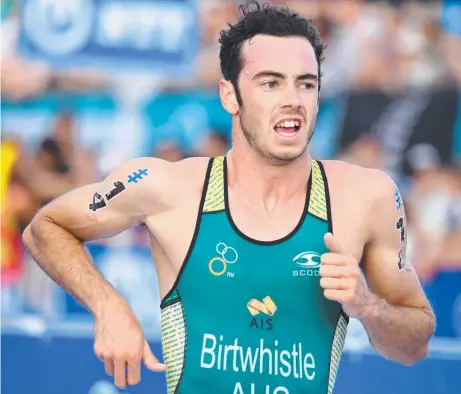  ??  ?? IN THE MIX: Jake Birtwhistl­e has taken the triathlon world by storm with an outstandin­g season.