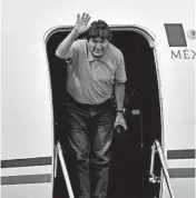  ?? CLAUDIO CRUZ/GETTY-AFP ?? Ex-Bolivian President Evo Morales lands in Mexico City.