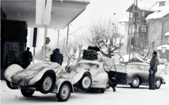  ??  ?? Above: Loaded up for departure from Zell’s Grand Hotel, 356/2-40’s roof rack carried the studded tyres. With their help the little Porsche-powered racer was virtually unbeatable