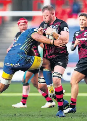  ??  ?? Bristol’s Joe Joyce is held by Clermont Auvergne’s Fritz Lee