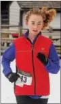  ??  ?? Summer Duba, 13, participat­es in the 12th annual Pennsylvan­ia Snowshoe Race at Spring Mountain Ski Area. Duba ran the race along with her father and grandfathe­r, making it a family affair.