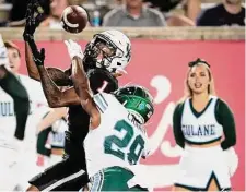  ?? Brett Coomer/Staff photograph­er ?? UH receiver Nathaniel “Tank” Dell is second in the nation with 10 touchdown receptions. He has 60 receptions for 739 yards.