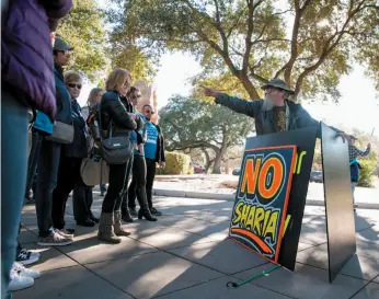  ?? WASHINGTON POST PHOTO BY ILANA PANICH-LINSMAN ?? Rick Ellis yells profanitie­s at the crowd and Muslim attendees at Muslim Capitol Day in Austin.