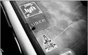  ?? RICHARD B. LEVINE/SIPA USA ?? The major ride-sharing companies have been held up as transforma­tional forces in the American economy.