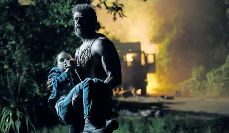  ?? ASSOCIATED PRESS HANDOUT ?? Dafne Keen, left, and Hugh Jackman in a scene from Logan.