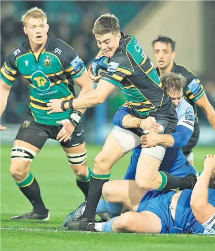  ?? ?? Double trouble: Tommy Freeman scored a brace of tries as Northampto­n destroyed a woeful Worcester side at Franklin’s Gardens