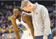  ?? DOUG MCSCHOOLER AP ?? Warriors’ Draymond Green, talking with coach Steve Kerr, is the latest big name added to COVID list.