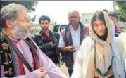  ?? HT PHOTO ?? Activist Irom Sharmila with her husband, British citizen Desmond Coutinha, after getting married in Kodaikanal on Thursday.