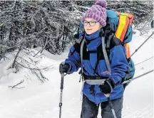  ?? Contribute­d ?? Sara Greenough heads out on the first day with 50 kilometres to go and standing on top of Dome Mountain.