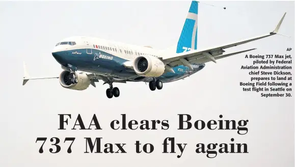  ??  ?? A Boeing 737 Max jet, piloted by Federal Aviation Administra­tion chief Steve Dickson, prepares to land at Boeing Field following a test flight in Seattle on September 30.