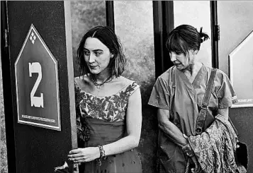 ?? A24 ?? Saoirse Ronan, left, and Laurie Metcalf are a tempestuou­s but loving mother and daughter in Greta Gerwig’s “Lady Bird.”