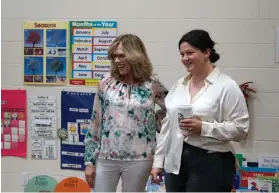  ?? NEWS PHOTO SAMANTHA JOHNSON ?? Principal Mary Printz of Accelerate­d Potential Christian Academy gives MLA Michaela Frey a tour of the school. Here they are saying hello to the kindergart­en class.